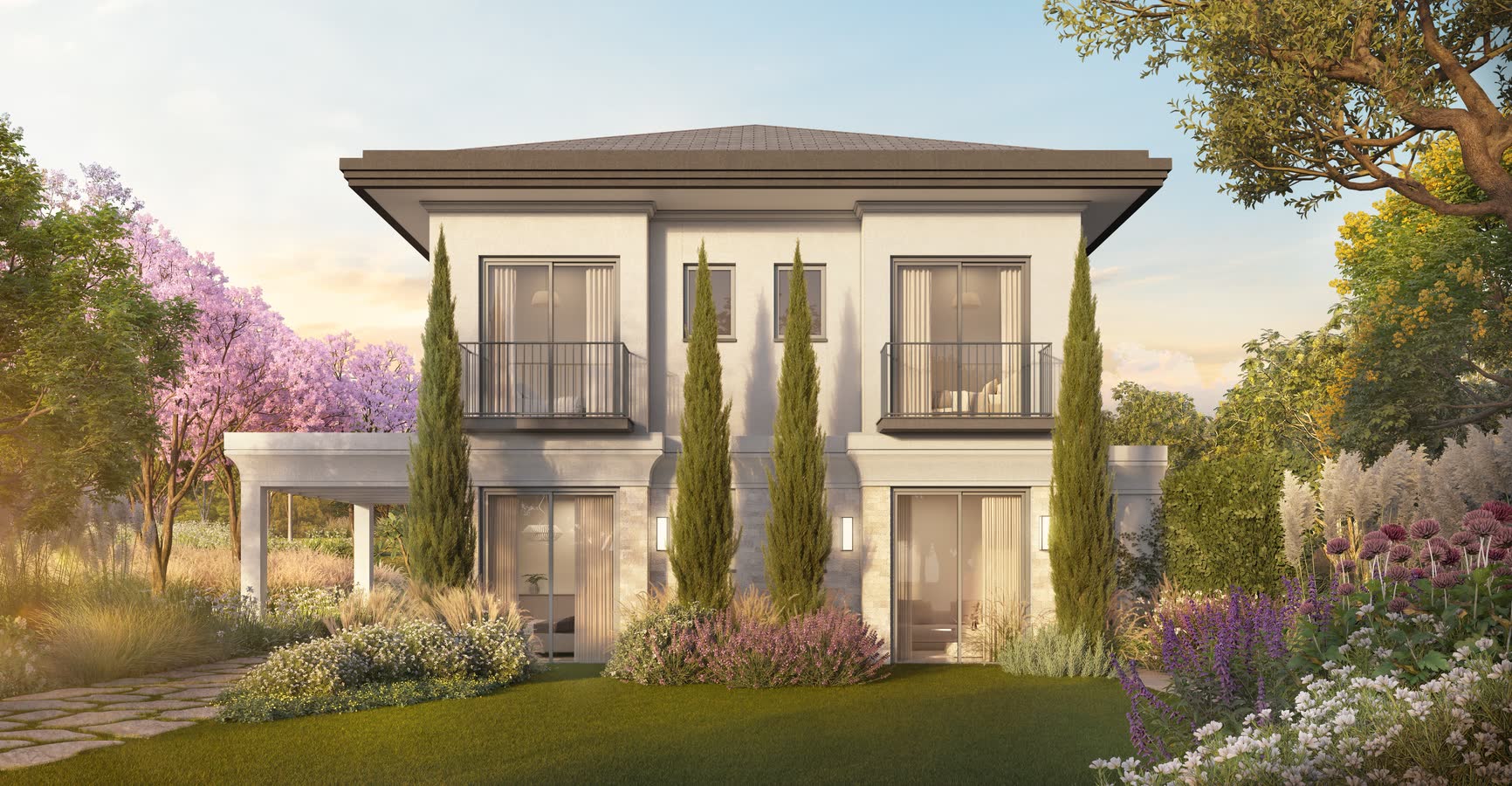 Fachada de casa Villa Riviera com ipês floridos
